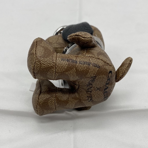 NWT Coach X Peanuts Snoopy BagCharm SIGNATURE Canvas Purse Keychain Logo Limited - Picture 6 of 8